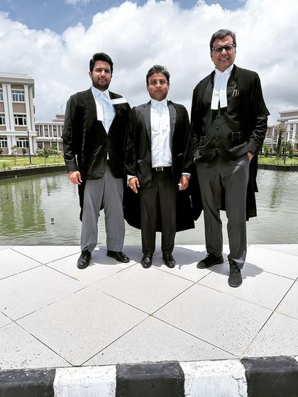 Standing with my well-prepared briefing counsels in Ranchi. Their support is invaluable when arguing cases away from my home base in Delhi.