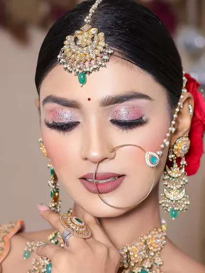 This image highlights the beautiful pink glitter eyeshadow. Learning to create such eye-catching looks is a key part of my advanced eye makeup module.