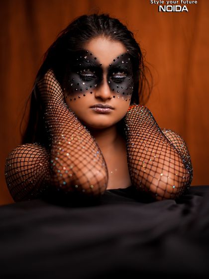 The full look, with sparkling fishnet gloves, creates a cohesive and striking fantasy character.