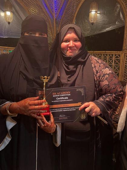 Posing with my award and certificate. Hard work truly pays off.