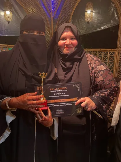 Posing with my award and certificate. Hard work truly pays off.