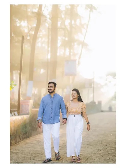Walking through a path lined with trees, with beautiful morning light filtering through, creating a magical atmosphere.
