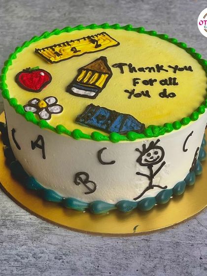 A fun and creative cake for Teacher's Day, decorated with cute, hand-drawn school supplies and a "Thank You" message.