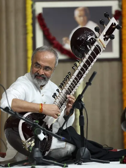 A photo from my concert at the Saptak festival in Ahmedabad. You can see the portrait of my Guru in the background, whose presence I always feel on stage.