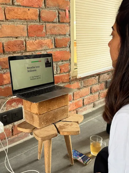This is what my online classroom looks like. From my home to yours, I guide live sessions designed to help you find stillness. It is a simple, authentic setup focused on connection and shared practice.