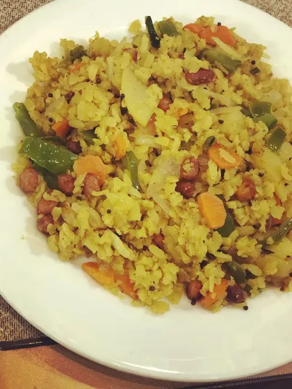 Poha is a perfect example of a traditional Indian breakfast that is both delicious and incredibly healthy. It is light on the stomach, a good source of healthy carbohydrates, and a natural probiotic. Adding vegetables and peanuts makes it a complete and balanced meal.