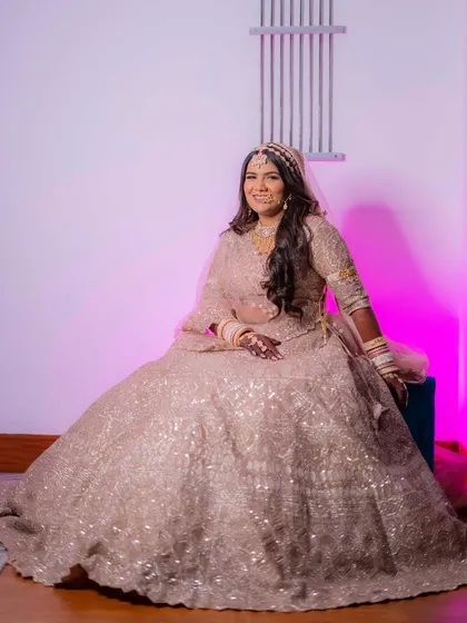 My bride Palak looking pure and gorgeous in her pastel wedding lehenga. The makeup is soft, dewy, and romantic, creating a truly ethereal bridal look.