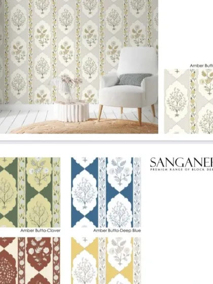 The 'Amber Butta' design, also from the Sanganeri collection. This wallpaper features a beautiful butta motif within a striped layout, offering a structured yet traditional feel.