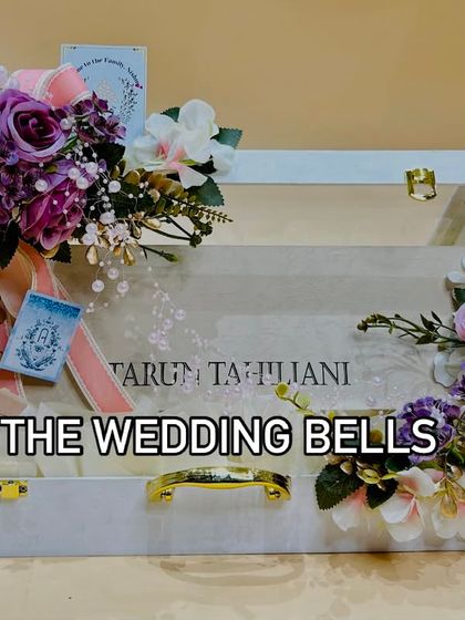 Elevating a Tarun Tahiliani gift box with our signature floral packing. This wooden trunk is perfect for a bride's trousseau.