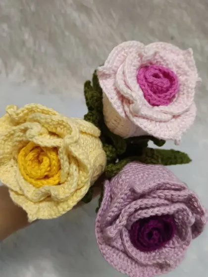 Another view of the three handmade dual-color roses, showing how they look together in a bouquet.