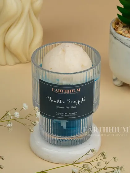 Wrap yourself in the warm, sweet scent of my Vanilla Snuggle candle. It's comfort in a jar.