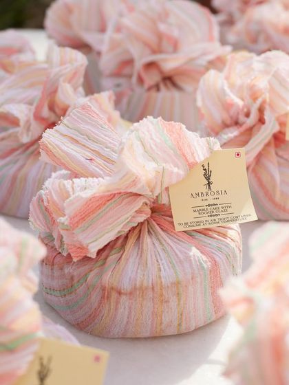 A close-up of our furoshiki-style fabric-wrapped gifts. This sustainable and elegant packaging option can be customized for any corporate or personal event.