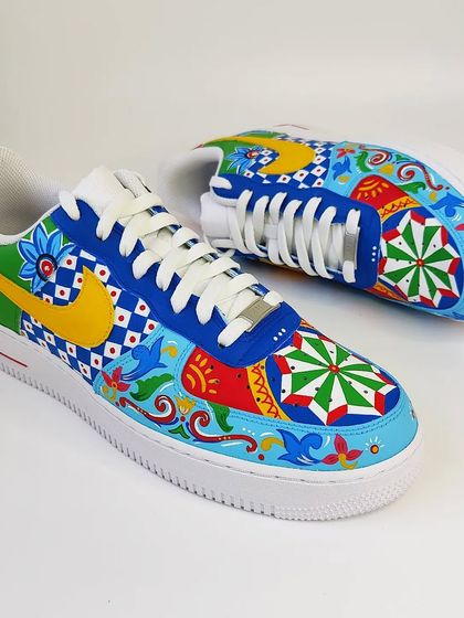 A top-down view of the mismatched truck art sneakers. You can see the different toe box designs and how the patterns play off each other.