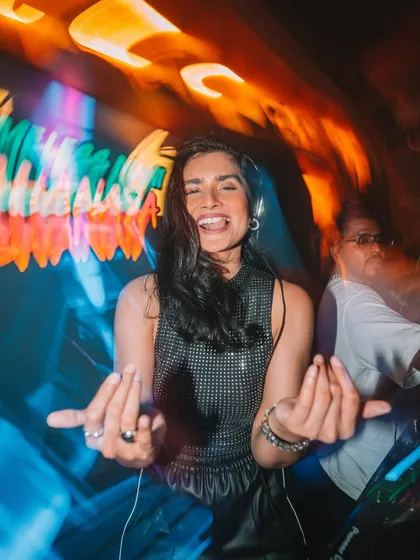 The energy at our SMXS Takeover in Navi Mumbai was electric. This shot captures the motion and excitement of a packed club night, where the music and the crowd become one.