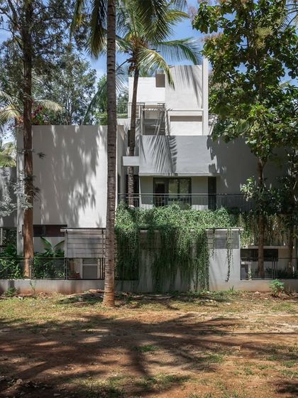 The massing of the SANCTUM House is broken down by cascading green terraces and balconies. This approach reduces the building's scale and allows the landscape to feel as if it is reclaiming the structure.
