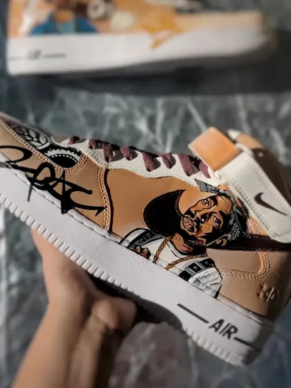 Holding the completed Tupac custom. So much work went into this pair, and I'm so happy with the result.