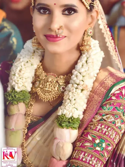 A candid moment with one of my real brides. This is the look of pure happiness I strive for. Her makeup is soft and natural, designed to last through all the emotions of the wedding day, and is complemented by a beautiful jasmine garland.