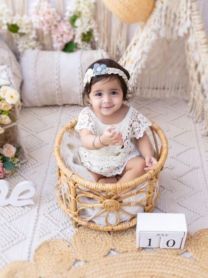 A sweet smile from a wicker basket. This shot is a perfect example of the charming and rustic portraits I create.
