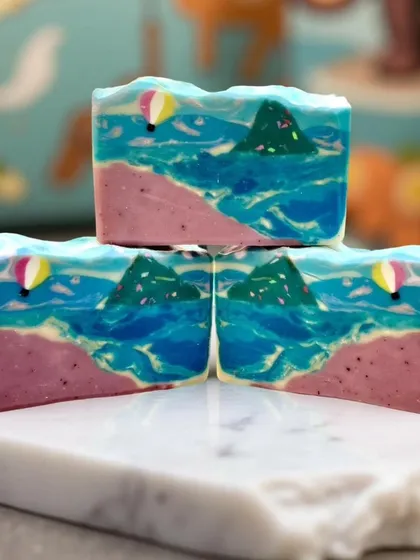 I love making beach-themed soaps. This bar captures the energy of swirling ocean waves against a pink sand beach, scented with a fragrance called Pink Sands.