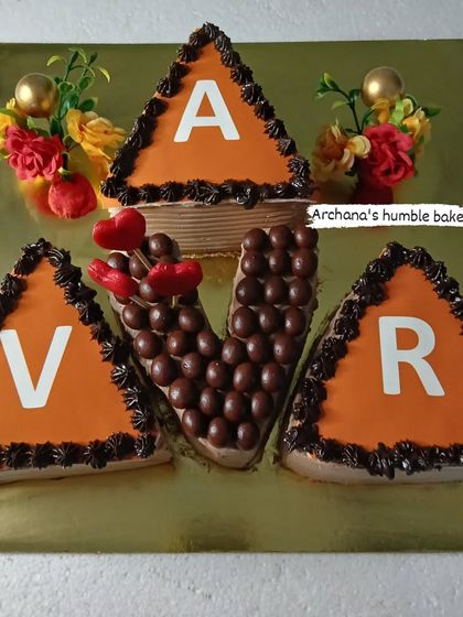 A unique alphabet cake that covers the whole family with their initials.