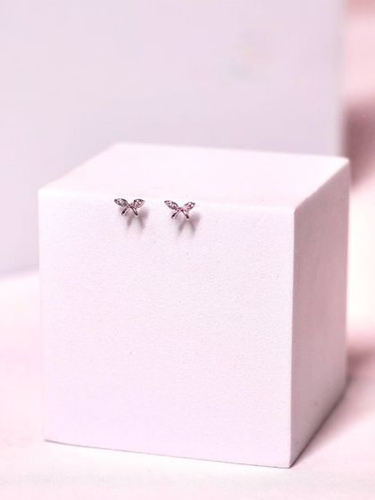 These tiny, delicate butterfly studs are perfect for a second or third lobe piercing, or for a subtle cartilage piercing.