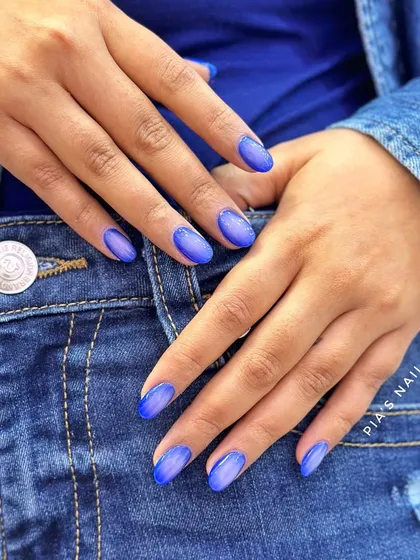 A full denim-on-denim look deserves the perfect nails to match. This vibrant blue is the perfect accessory.