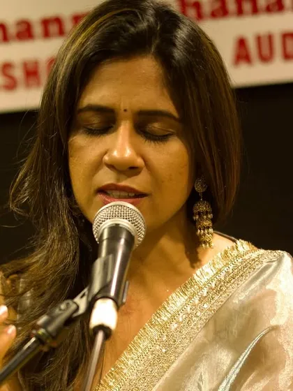 A close-up of the artist, lost in her music during the "Phir Le Aayi Dil" show. Her expressive performance connected deeply with everyone in the audience, making for a truly magical evening.