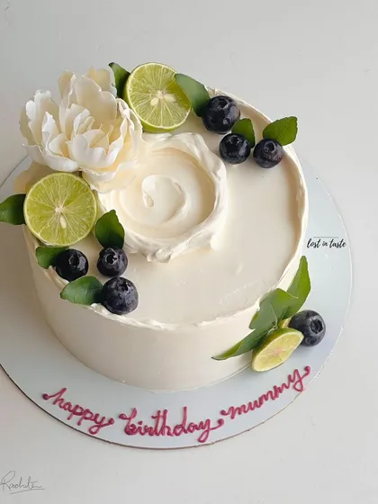 My most popular creation, the signature Italian Lemon & Blueberry cake. I offer many design variations, all featuring fresh blueberries, zesty lime, and smooth buttercream.