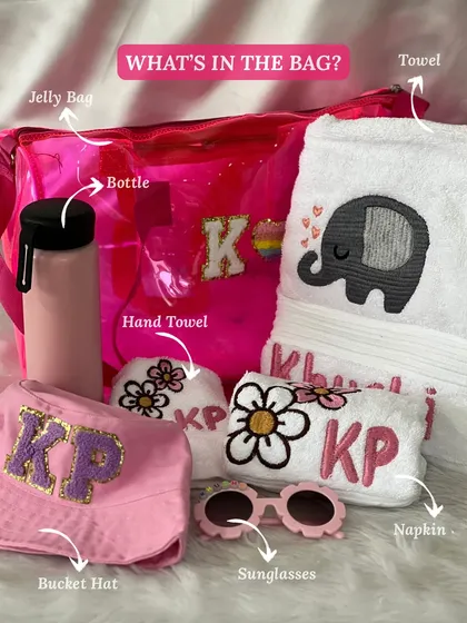 Rakhi just got cooler with this kids' swim hamper! It's the perfect gift for little siblings, packed with a personalized jelly bag, bucket hat, sunglasses, and embroidered towels.