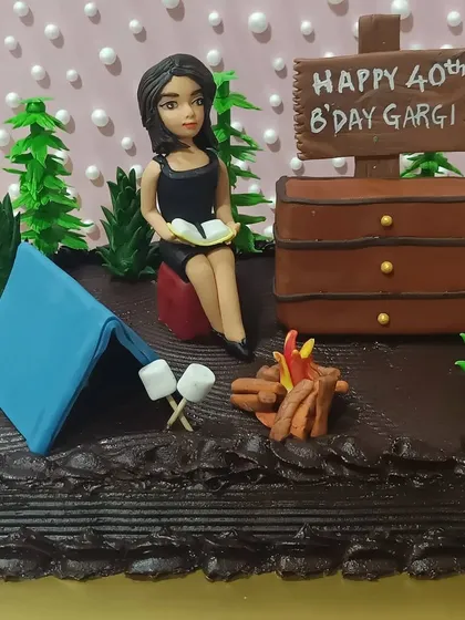 Everyone deserves a celebration cake. This camping-themed creation was a special order: a vegan, gluten-free cake made with jaggery and a homemade jaggery truffle. I can accommodate various dietary needs without compromising on taste or design.