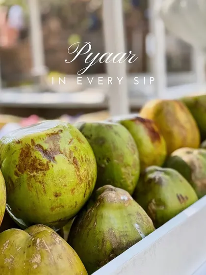 'Pyaar in every sip.' This close up of the fresh coconuts on my cart captures the simple, natural goodness of this welcome drink.