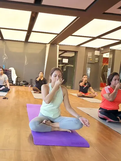 Meditation is food for the soul. Here, a class practices pranayama to purify their energy and bring a sense of calm and clarity.