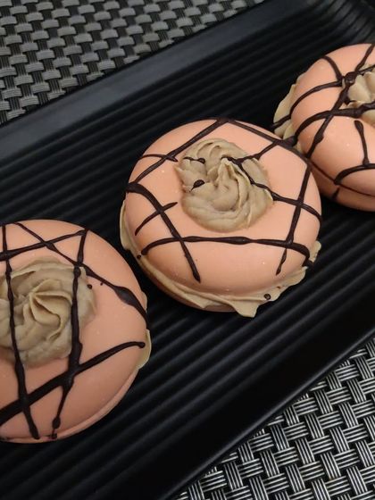 This is a cold process donut soap, made with nourishing oils like olive and coconut oil. The whipped soap topping and chocolate drizzle make it look like a decadent coffee-flavored treat.