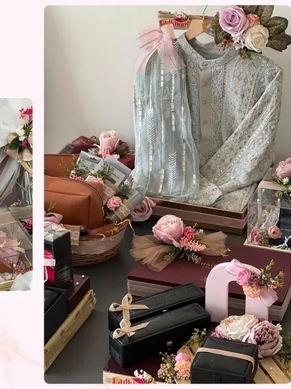 A beautiful display of trousseau packaging for both the bride and groom. The coordinated colors and floral arrangements ensure that the gift exchange looks as beautiful as the ceremony itself.