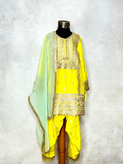 Another shot of the popular yellow Pimmo kurta set, a bright and cheerful choice for any celebration.
