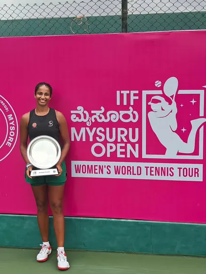 Celebrating a significant victory on the international stage. Our player Riya Bhatia proudly holds the doubles championship trophy at the ITF W15 Mysuru Open, a key milestone on the Women's World Tennis Tour.