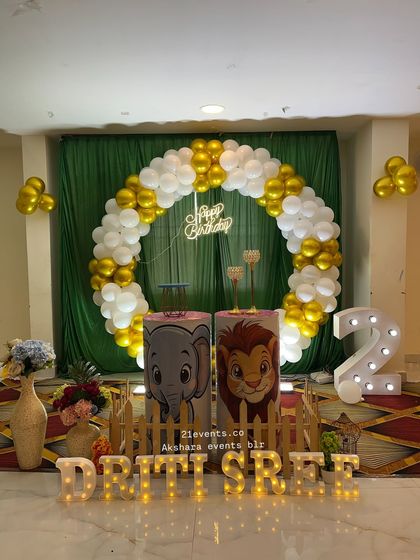 A full view of the Lion King character setup for a 2nd birthday.