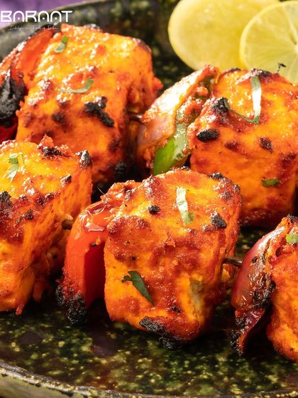My Paneer Tikka is the crown jewel of Indian appetizers. Soft paneer and crisp vegetables are marinated and grilled, offering smoky and tangy flavors.