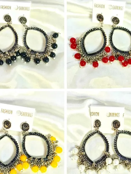 Our collection of open-back earring bezels with colorful beads is perfect for making vibrant, dangly earrings. Available in multiple colors like black, red, yellow, and white, they offer endless design possibilities.