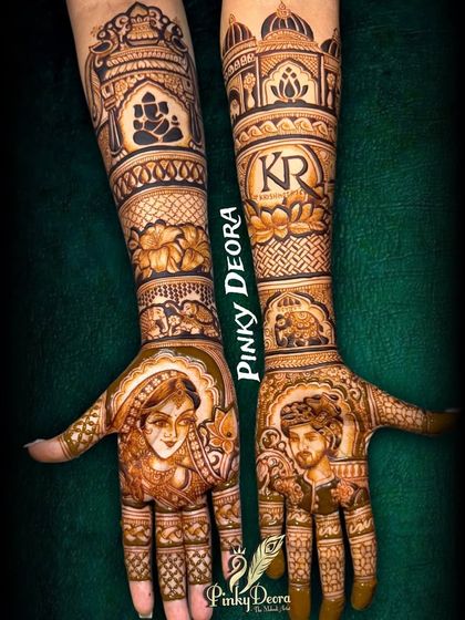 A stunning bridal portrait mehndi featuring the bride and groom, along with a Ganesha motif for blessings. The detail in the faces is a skill we teach in our masterclass.