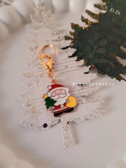 The jolly Santa Claus charm, ready to bring smiles and holiday cheer to your bag or keys.