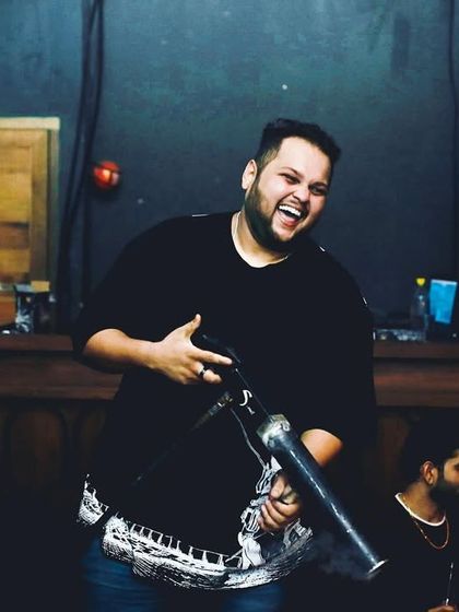 A moment of pure joy, laughing while holding a CO2 gun. This moment is your life.