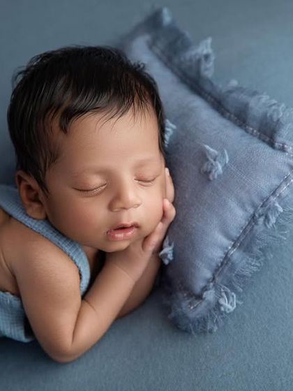 Adding a small pillow gives the baby a comfortable place to rest his head, creating a slightly different look for the side pose.