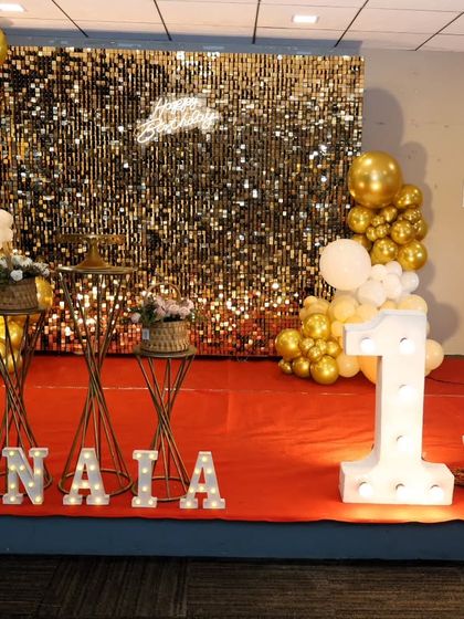 Another angle of the 13th birthday party, showing the full stage on a red carpet.