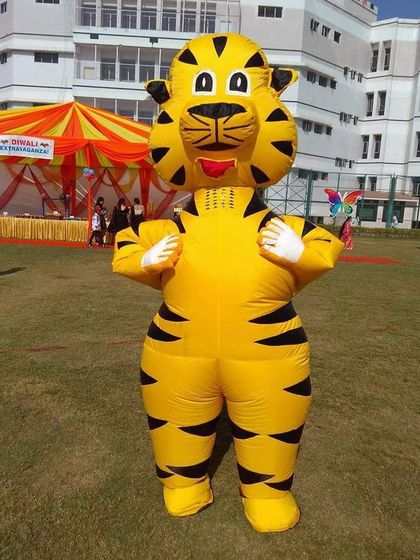 A friendly inflatable tiger mascot, perfect for a jungle-themed party or any event needing a cheerful character.
