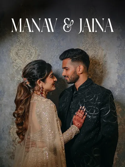 A classic and elegant portrait of the couple from their Sangeet night. The sophisticated backdrop and their loving gaze make this a timeless image.