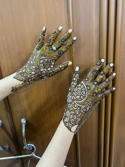 Another view of the unique crescent design, showing how it elegantly covers the back of the hand.