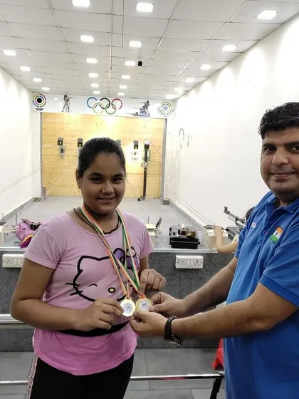 Another one of our dedicated students receiving her medals at the academy. Her hard work in training sessions is clearly translating into competition success.