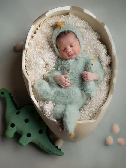 The cutest little dino boy. For this home shoot, we brought a prehistoric jungle to life with a fun dinosaur theme.