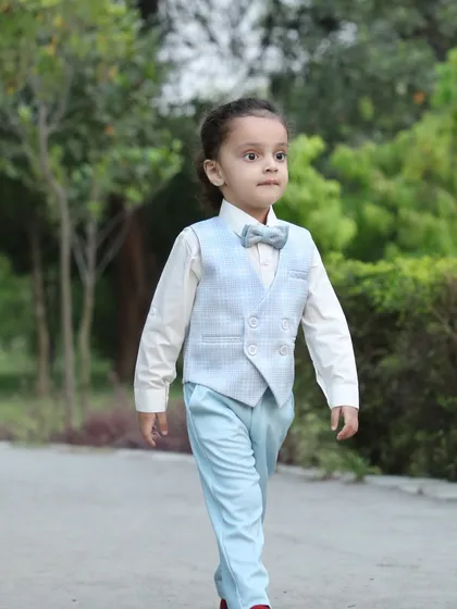 Even during a family shoot, I make sure to get individual portraits of the kids. This candid shot captures a young boy's curious personality as he walks through the park.